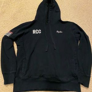 Rapha RCC Hoodie Size M in black with white and pink accents. Pockets in front.